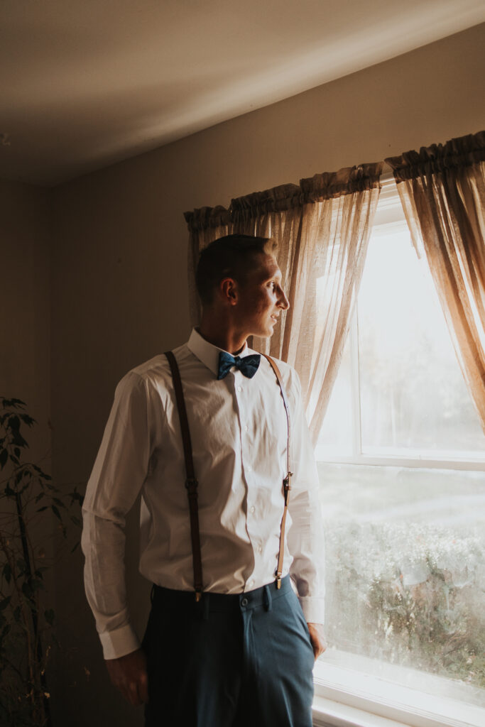 getting ready photos with groom