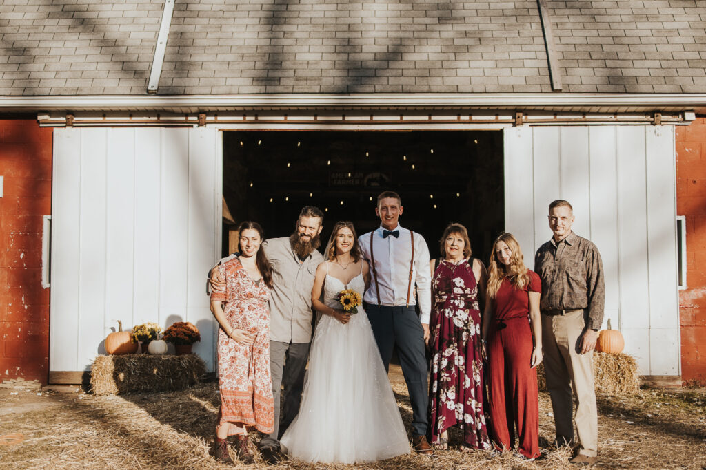 couple pose with their guests