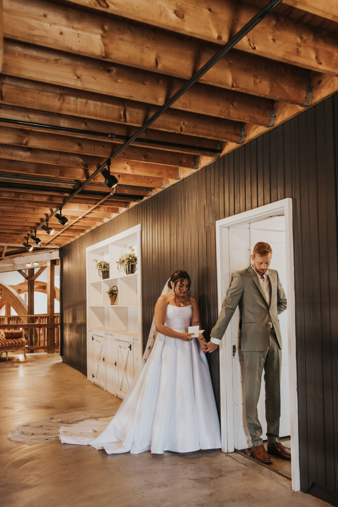 couple has first touch before wedding