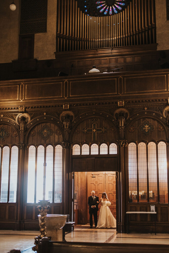 bride enters church wedding ceremony