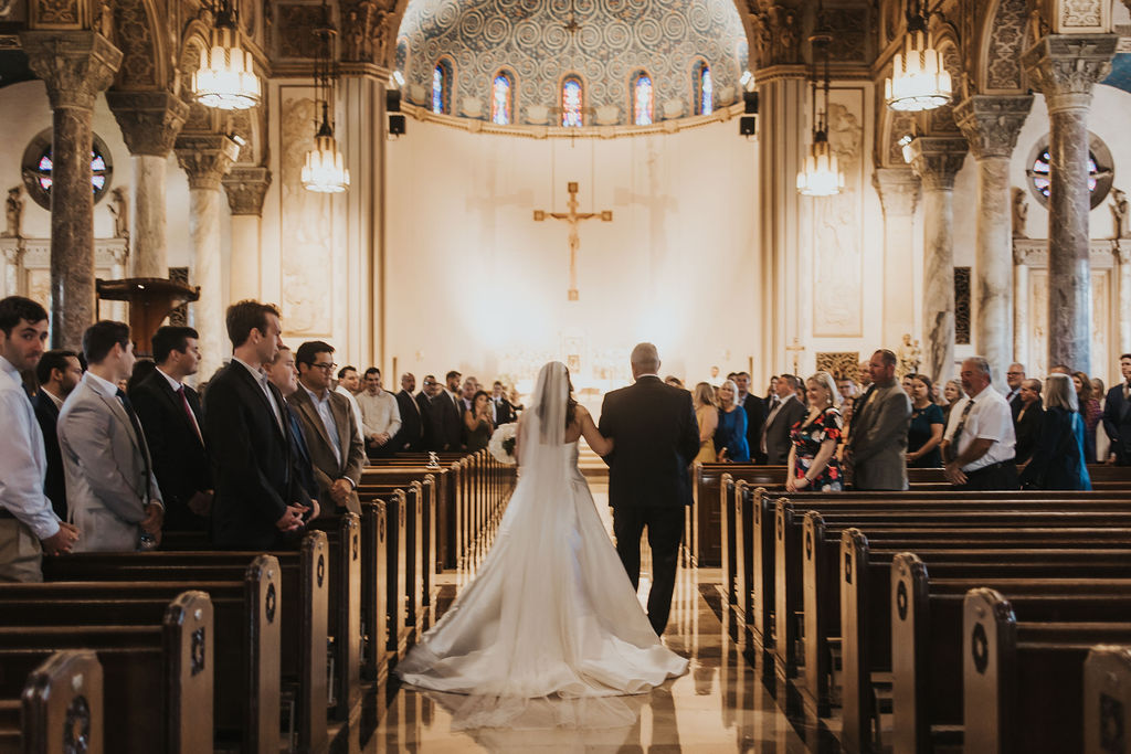 bride walks down aisle part of Cleveland wedding locations