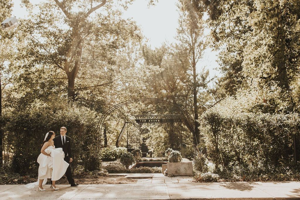 couple walks along Cleveland Cultural Gardens