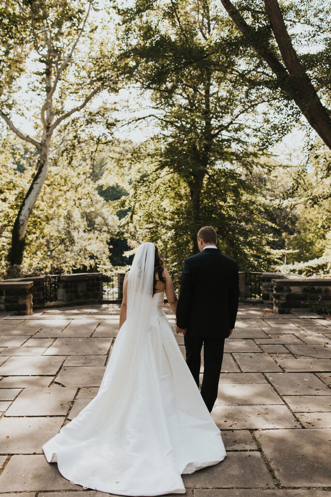 couple walks along Cleveland Cultural Gardens