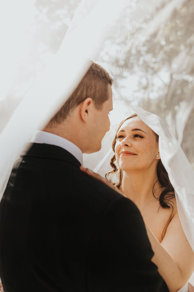 couple embraces during wedding portraits