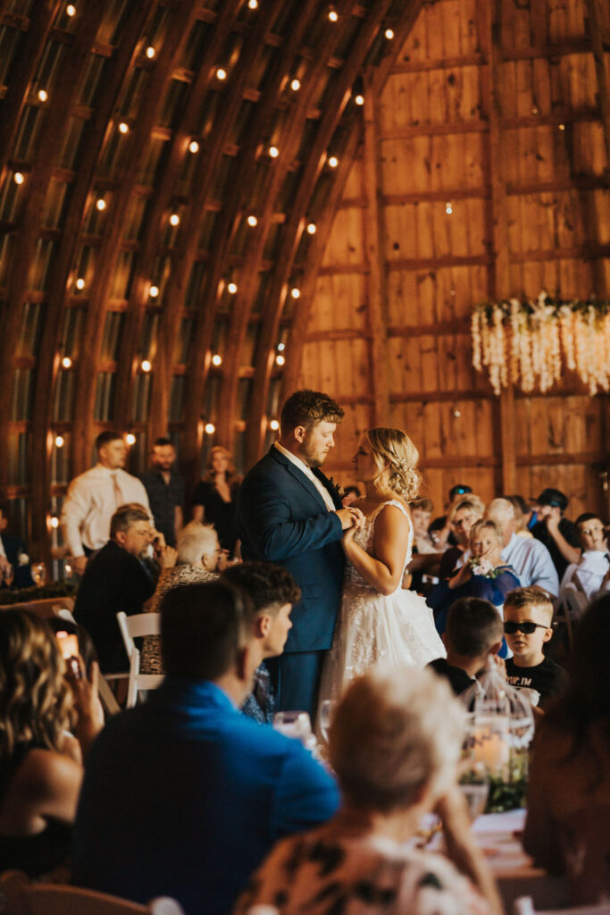 couple dance together during Harvest Moon wedding reception