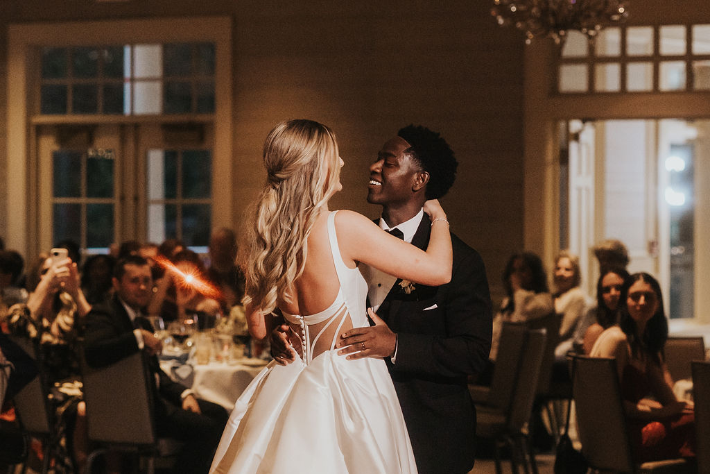 couple dances together during wedding reception