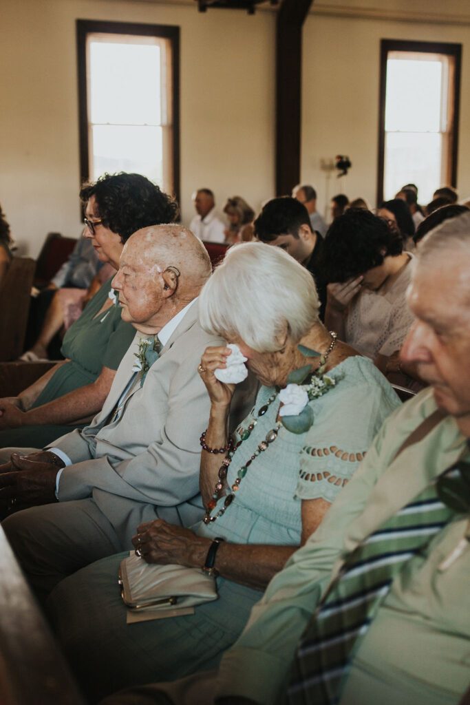 grandparents cry during wedding ceremony