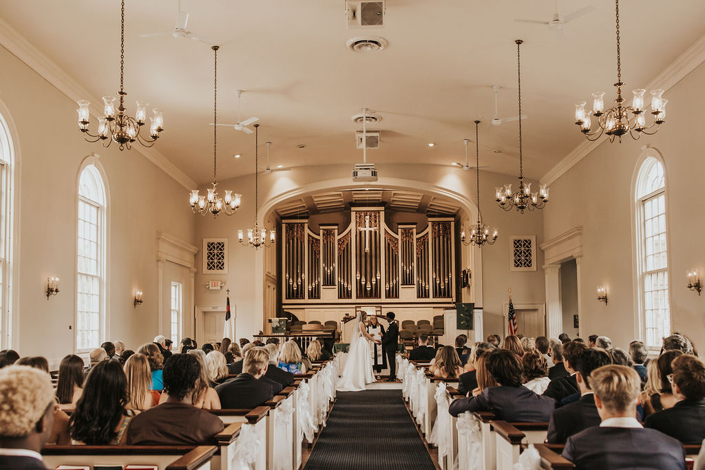 couple exchanges vows during wedding ceremony