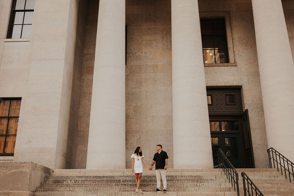 couple standing on steps of Ohio Statehouse