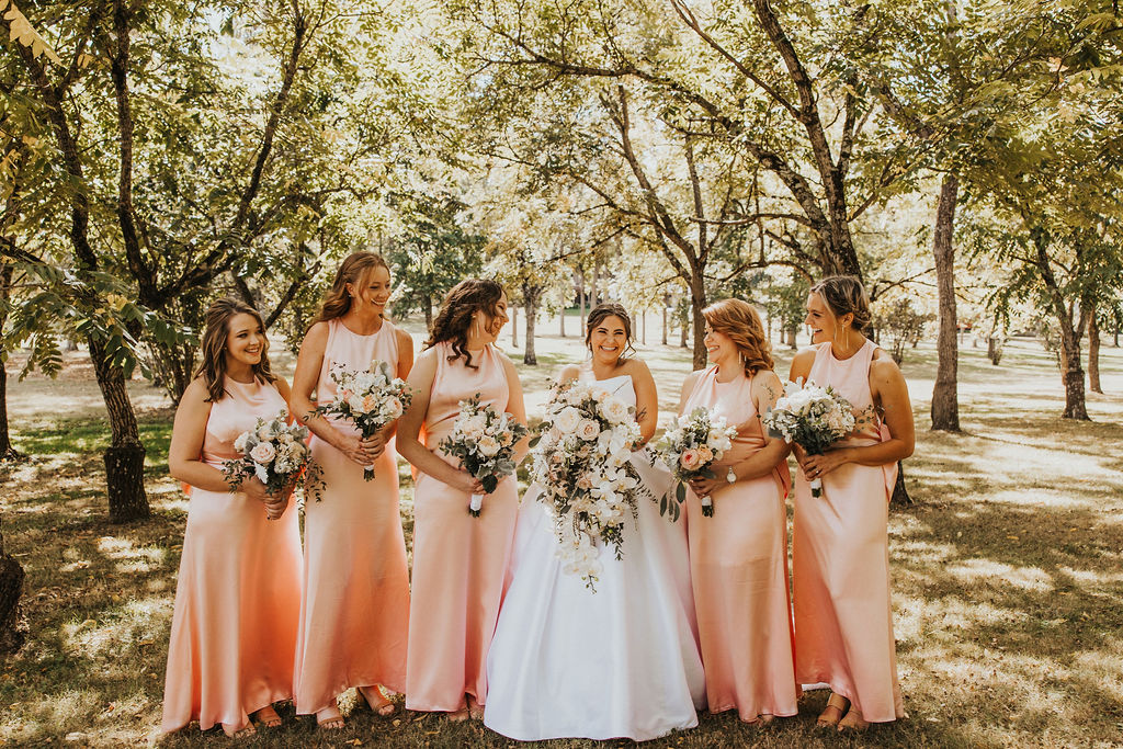 bridal party poses together