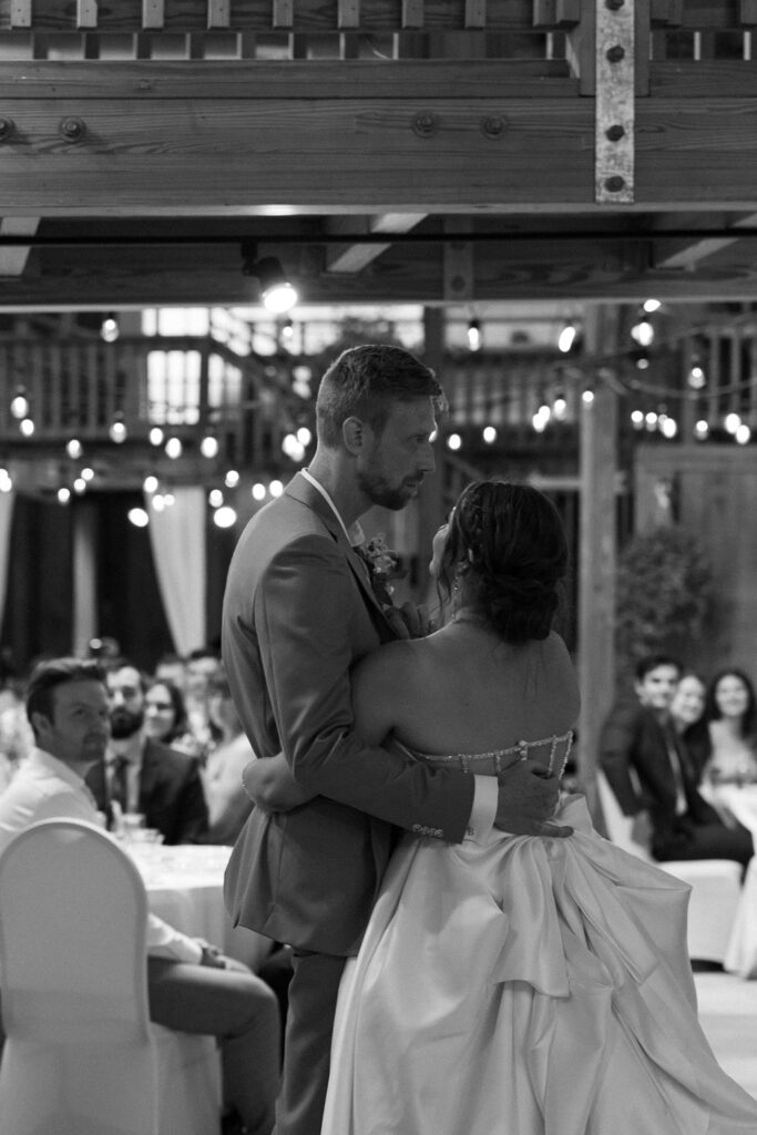 couple embrace during their first dance
