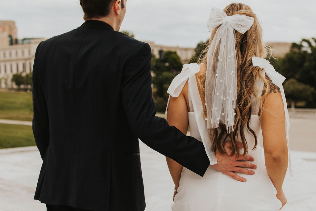 Close-up of an engaged couple walking together at the Cleveland Museum of Art